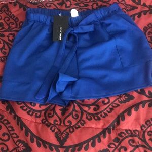 I have a size large shorts blue still has the tag